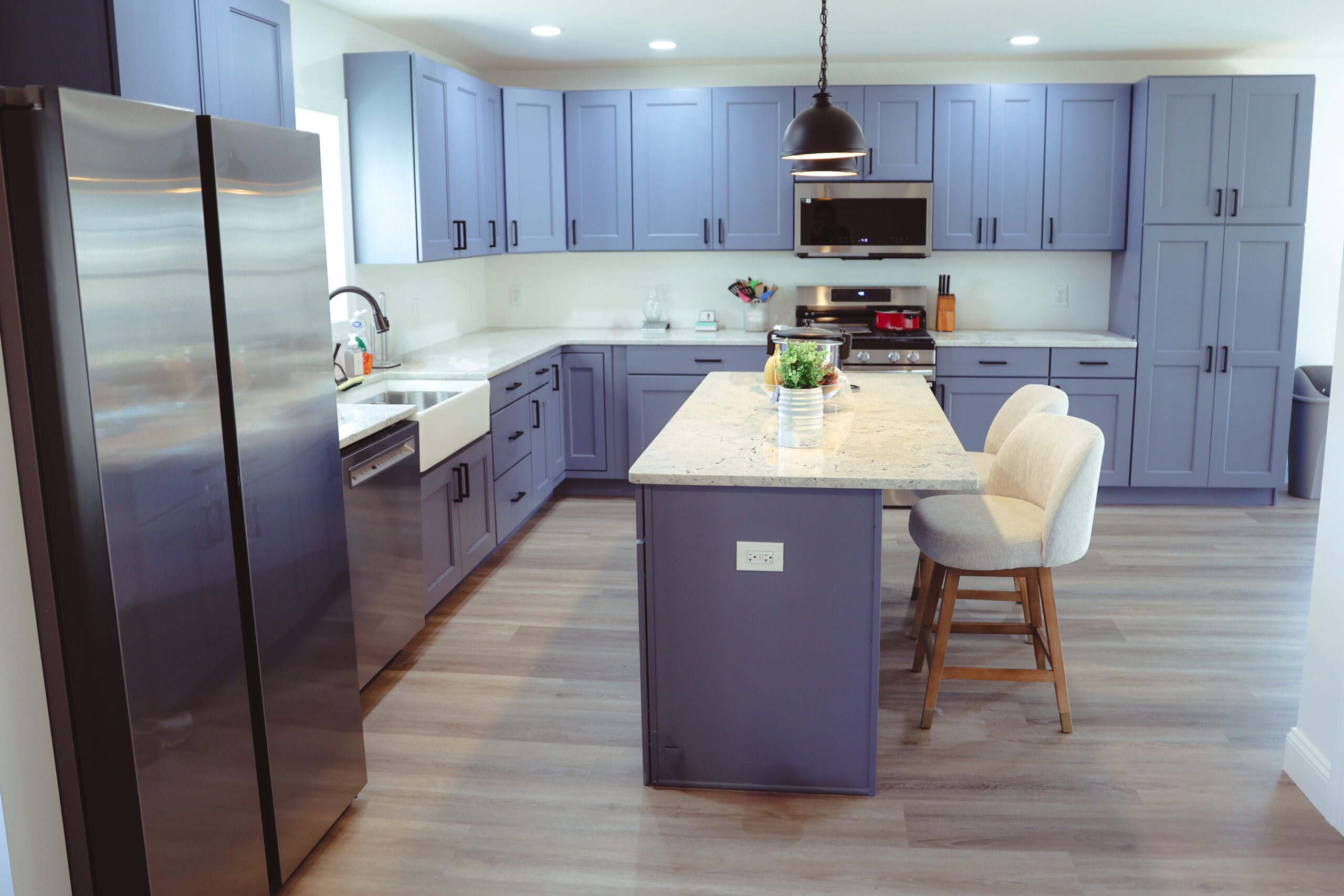 Professional photo of a remodeled kitchen featuring modern design and high-end finishes, shot by Ink & Arrow Co.