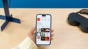 User Checking Social Media on Mobile Device – Digital Engagement on the Go - Ink & Arrow Marketing Co. Social Media Management Services by Ink & Arrow in Berwick, PA
