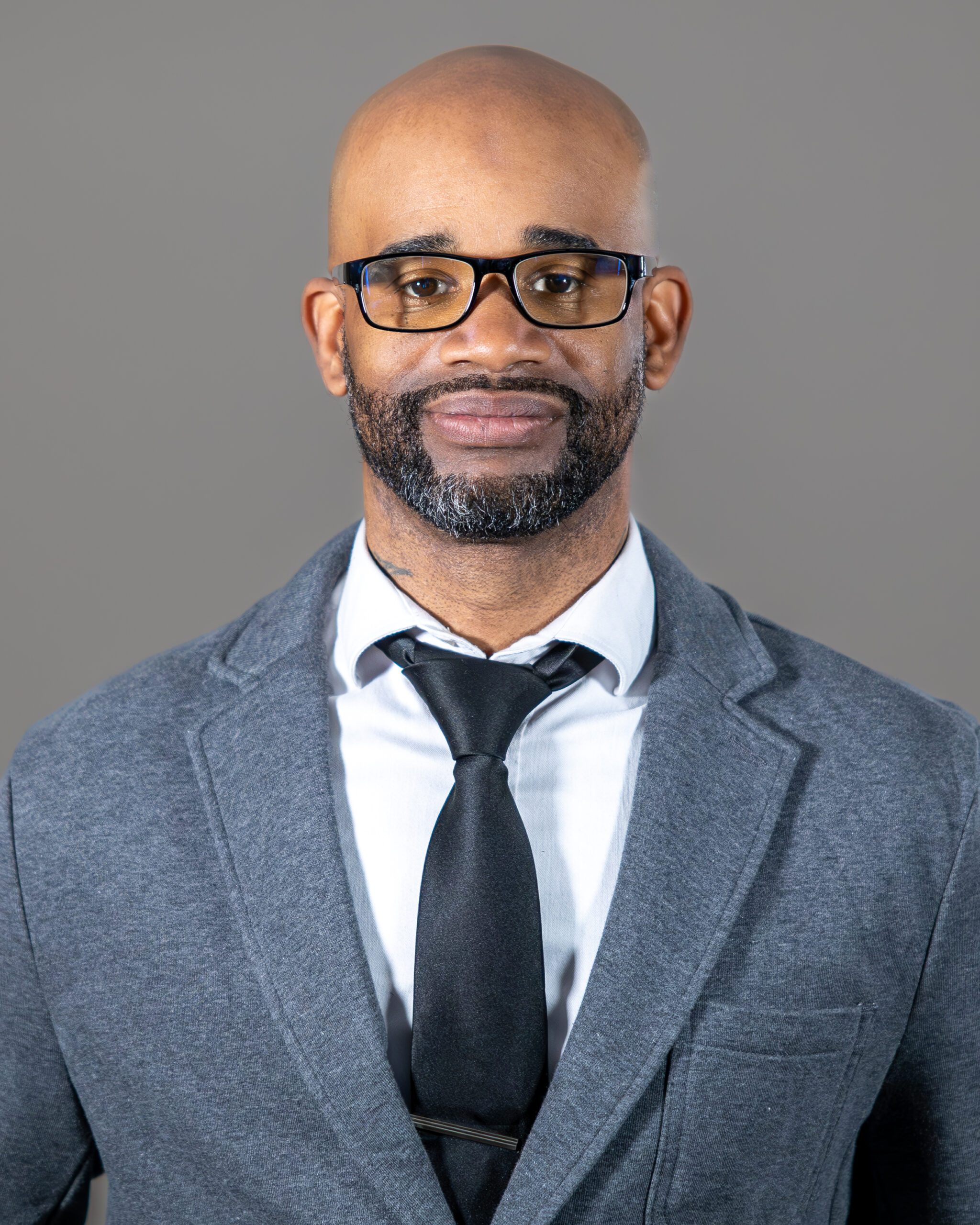Jovalle Dizard Headshot of web administrator looking forward with confidence, professionalism, and ambition to lead in the tech industry